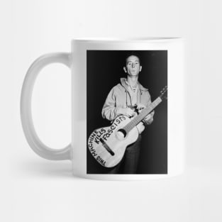 woody guthrie - this machine kills fascists Mug